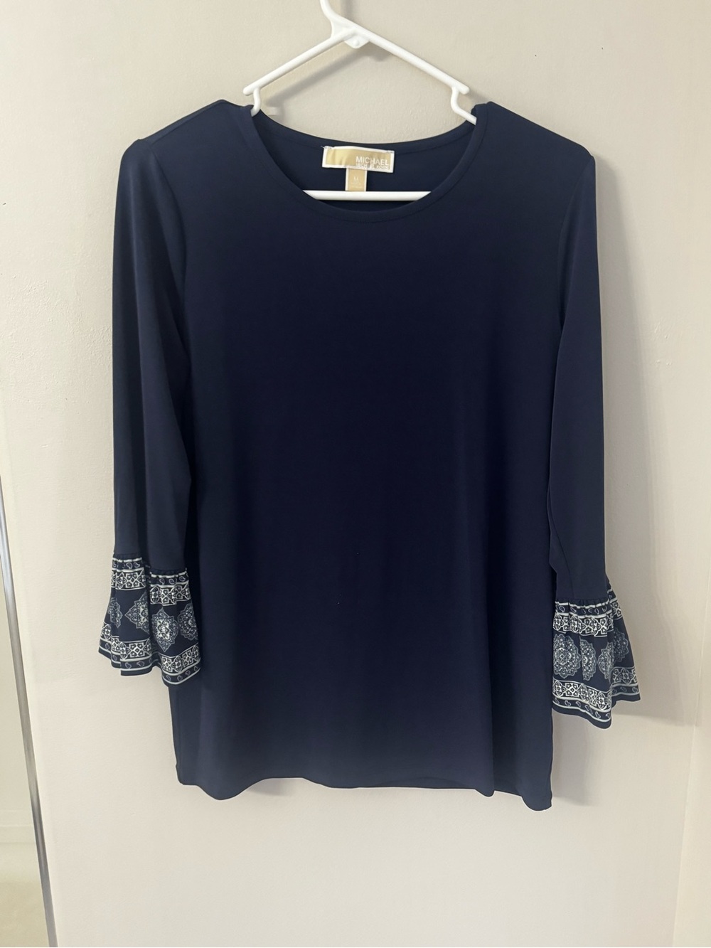 Michael Kors Navy Blue Bell Sleeve Top Size M White Paisley Border Gold Logo Bar